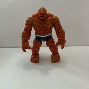 Orange Action Figure Toy